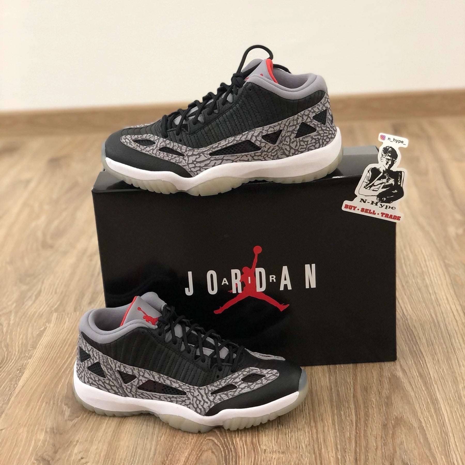 Jordan 11 Retro Low IE Black Cement - Image 4