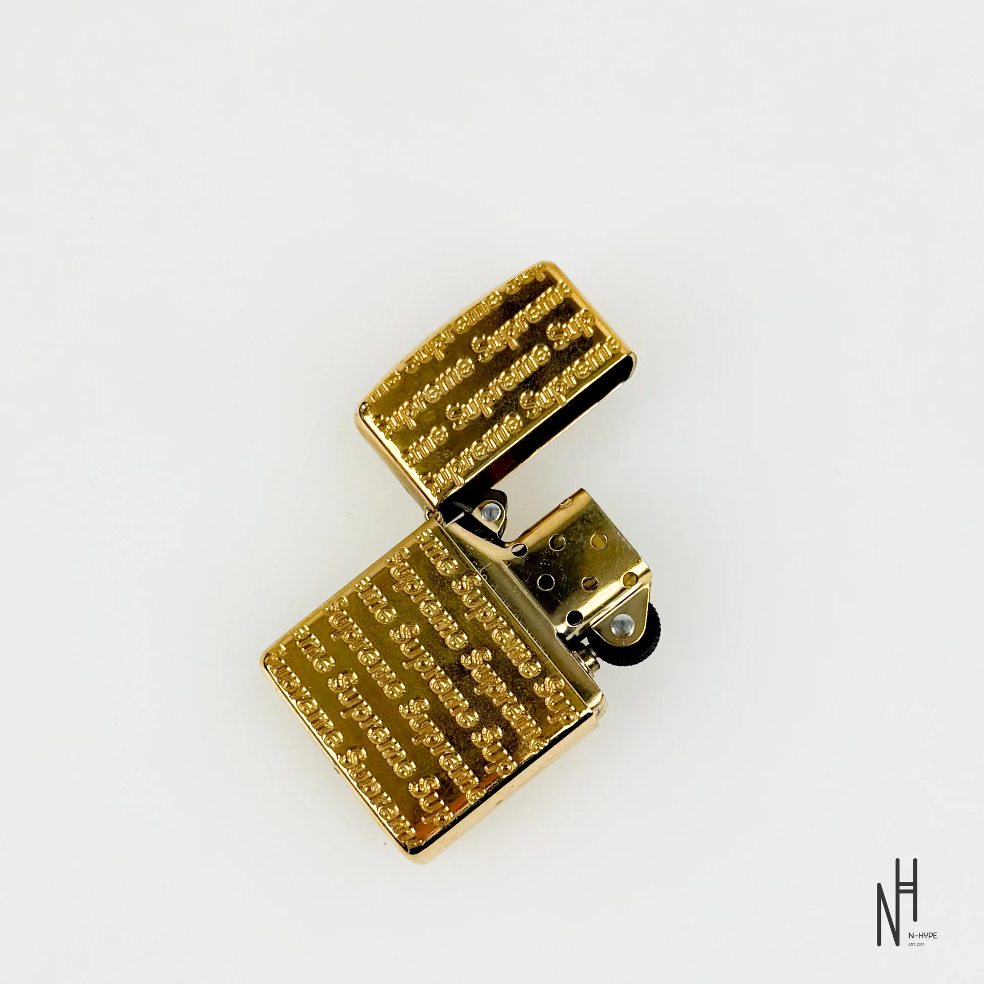 Supreme Repeat Engraved Zippo Gold - Image 6