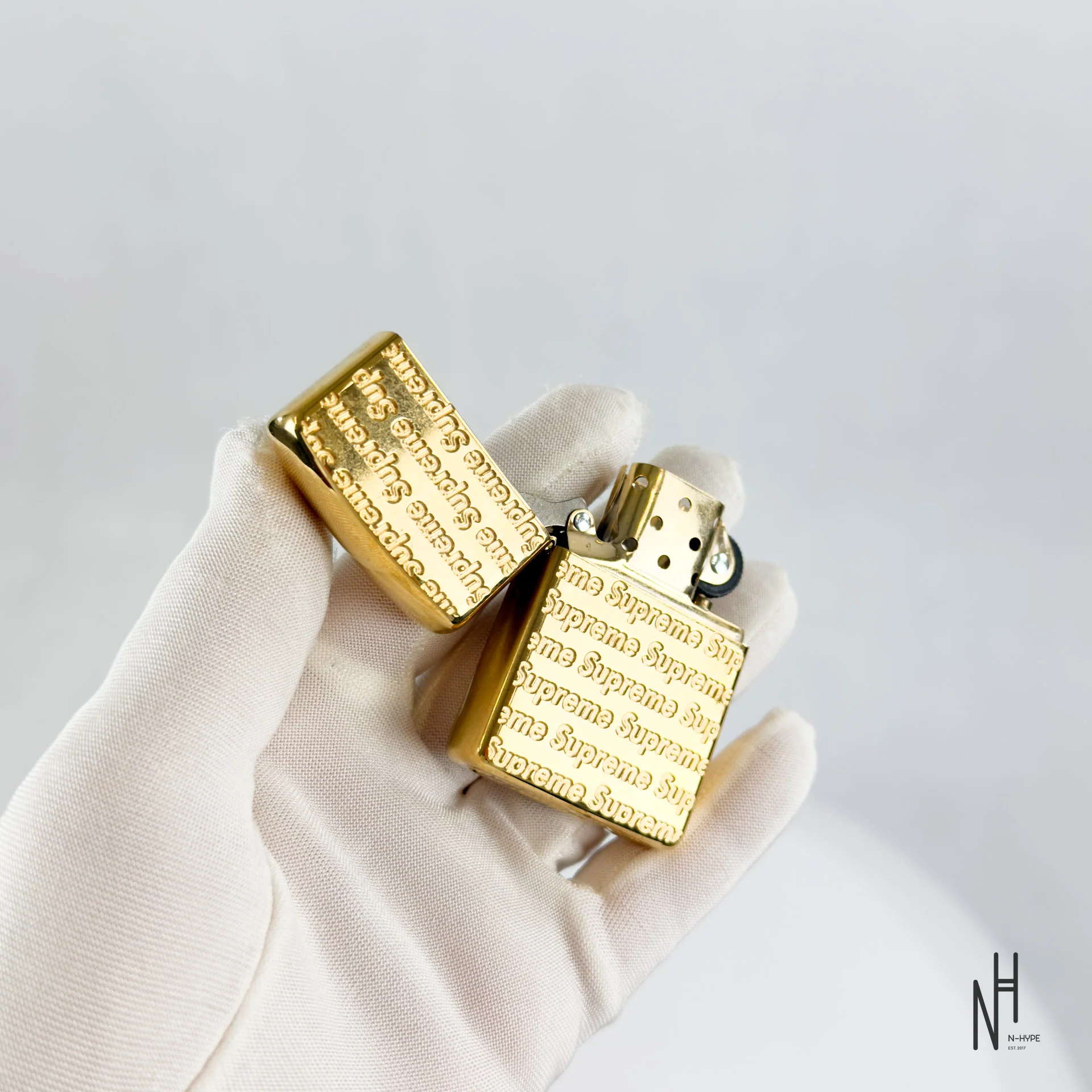 Supreme Repeat Engraved Zippo Gold - Image 8